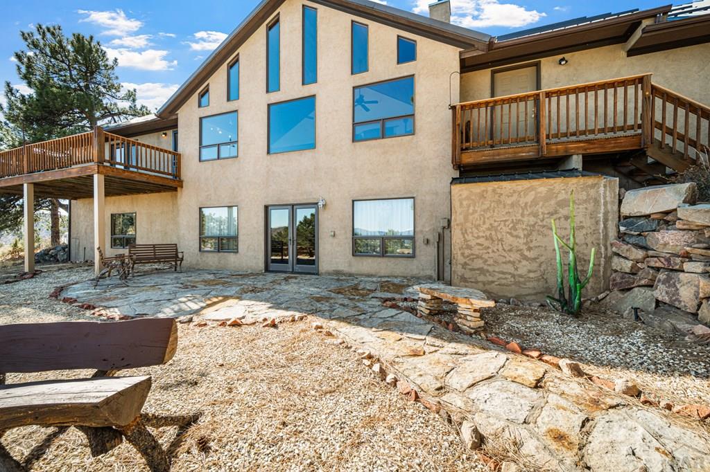 1301 Pheasant Loop Westcliffe, CO 81252 - Photo 3 of 27 a view of a house with backyard and sitting area