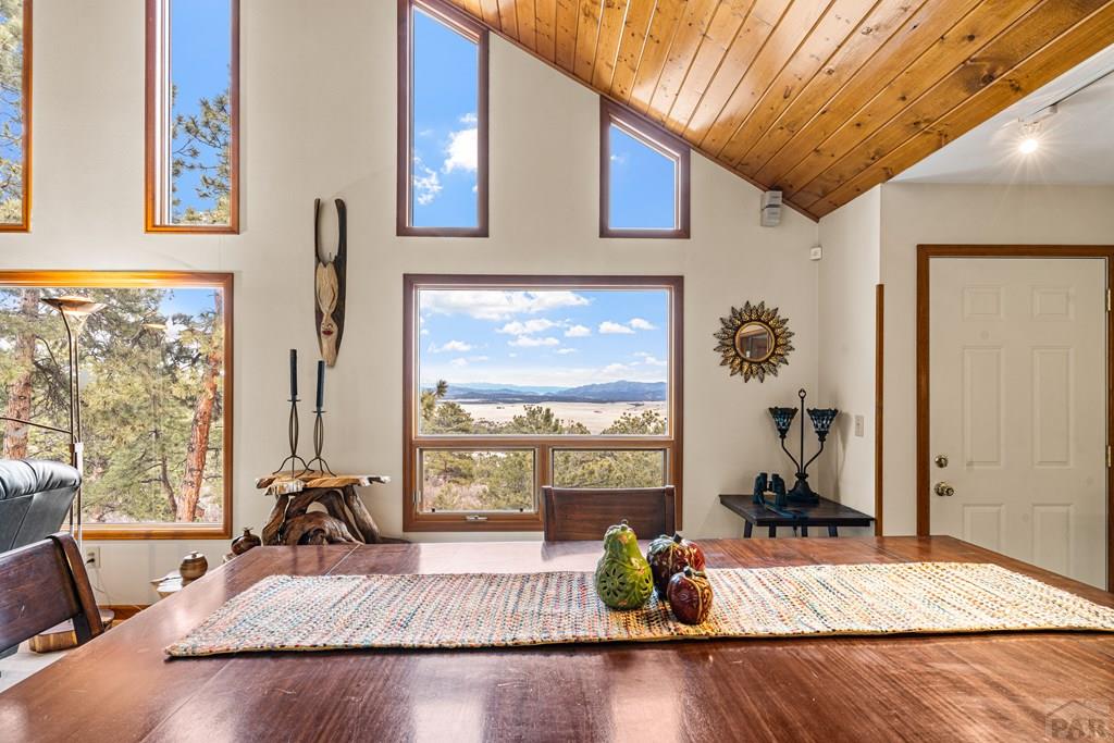 1301 Pheasant Loop Westcliffe, CO 81252 - Photo 8 of 27 a living room with furniture and a large window