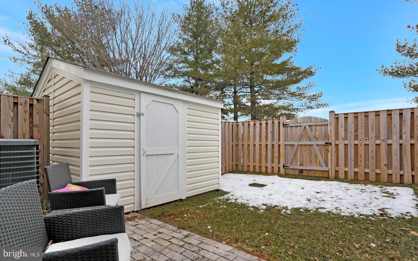 577 Lancaster Place Frederick, MD 21703 - Photo 18 of 19 a view of a wooden fence
