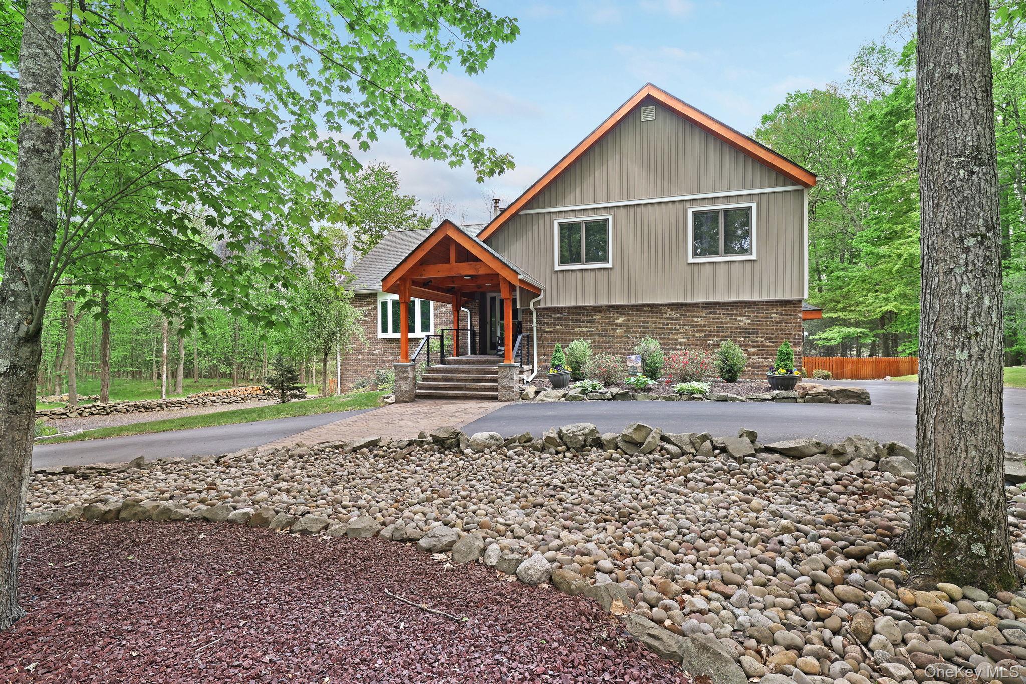 90 M And M Road Middletown, NY 10940 - Photo 12 of 50 a front view of a house with a yard