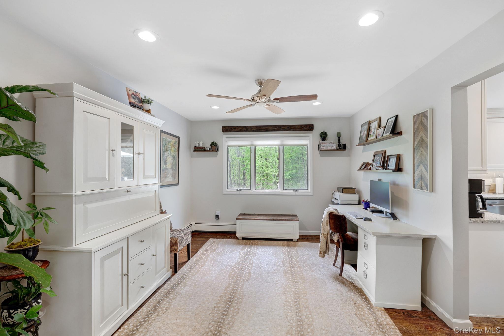 90 M And M Road Middletown, NY 10940 - Photo 17 of 50 a workspace with furniture a window and a potted plant