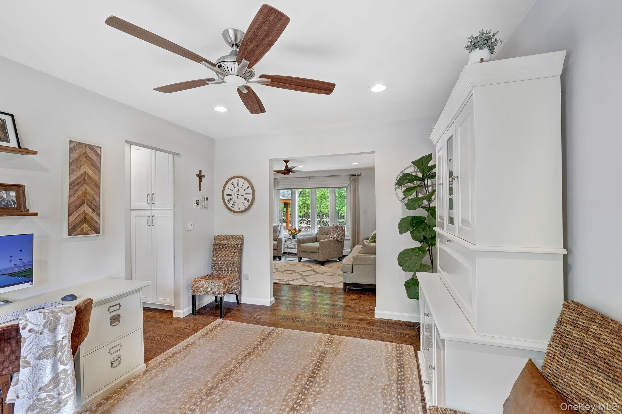 90 M And M Road Middletown, NY 10940 - Photo 18 of 50 a living room with furniture and a clock