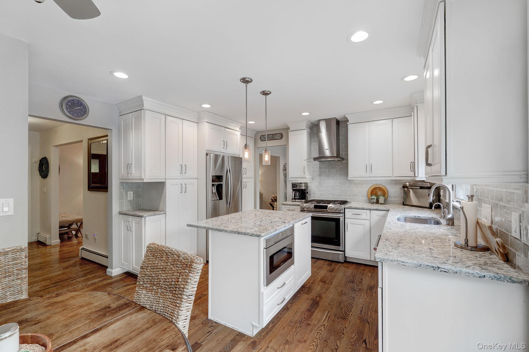 90 M And M Road Middletown, NY 10940 - Photo 2 of 50 a large kitchen with stainless steel appliances granite countertop a stove a sink a refrigerator and a microwave