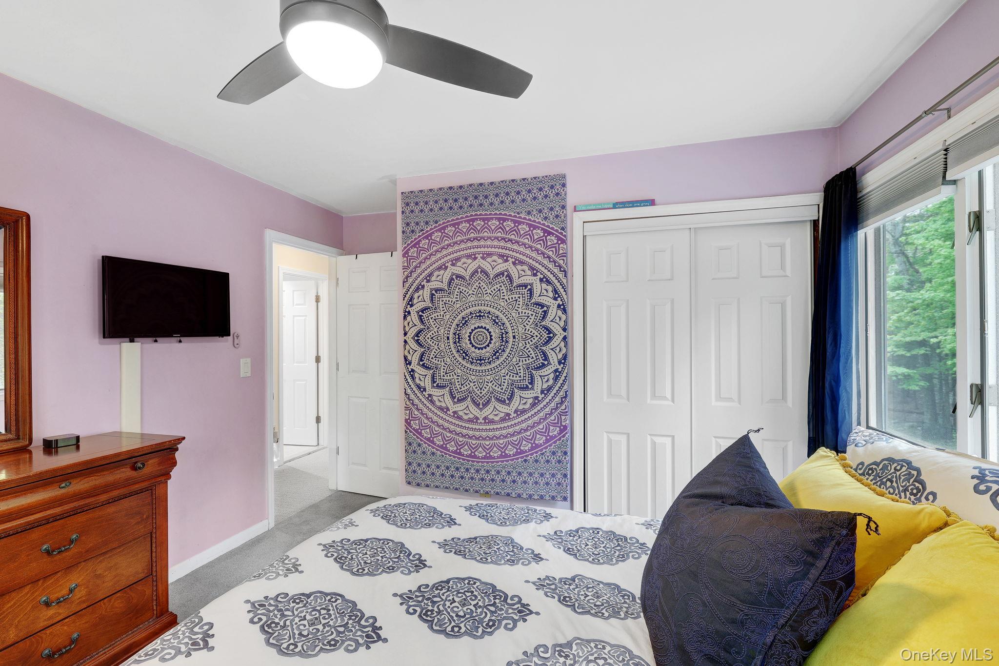 90 M And M Road Middletown, NY 10940 - Photo 29 of 50 a bedroom with a bed and a television