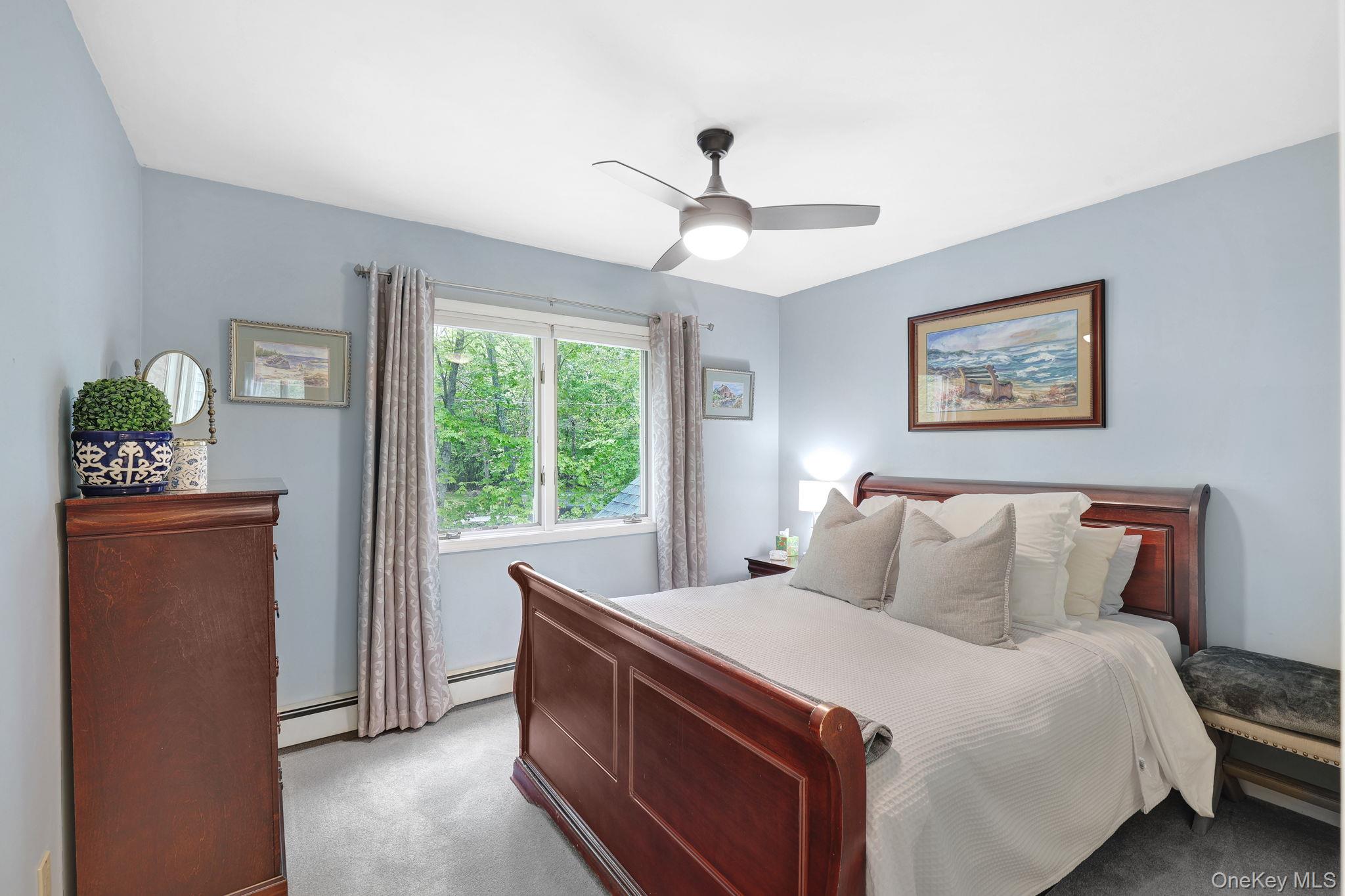 90 M And M Road Middletown, NY 10940 - Photo 32 of 50 a bedroom with a bed and a window