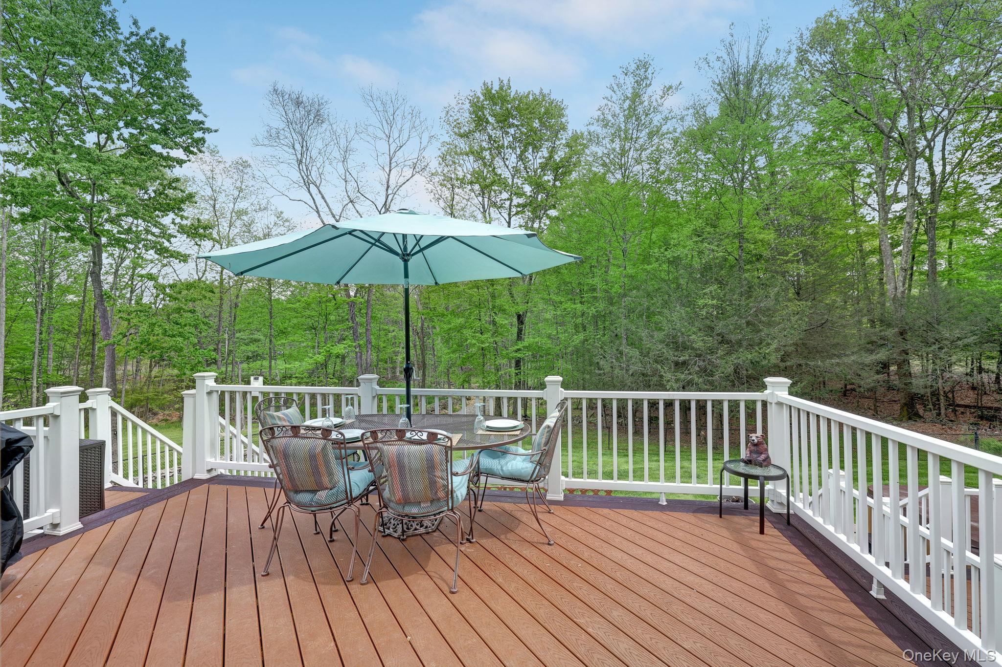 90 M And M Road Middletown, NY 10940 - Photo 36 of 50 a view of a deck with wooden floor and yard