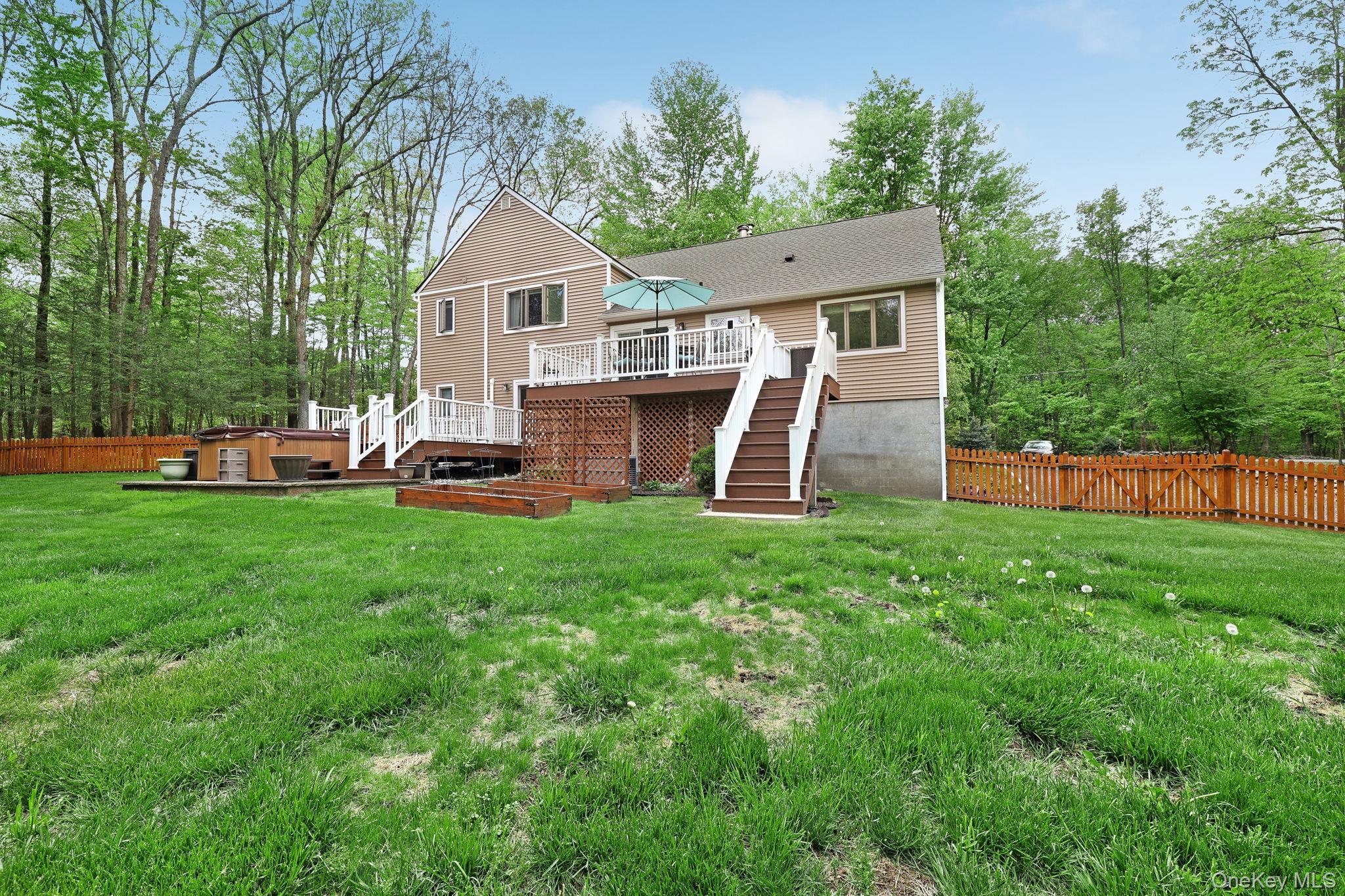 90 M And M Road Middletown, NY 10940 - Photo 38 of 50 a front view of a house with a yard and green space