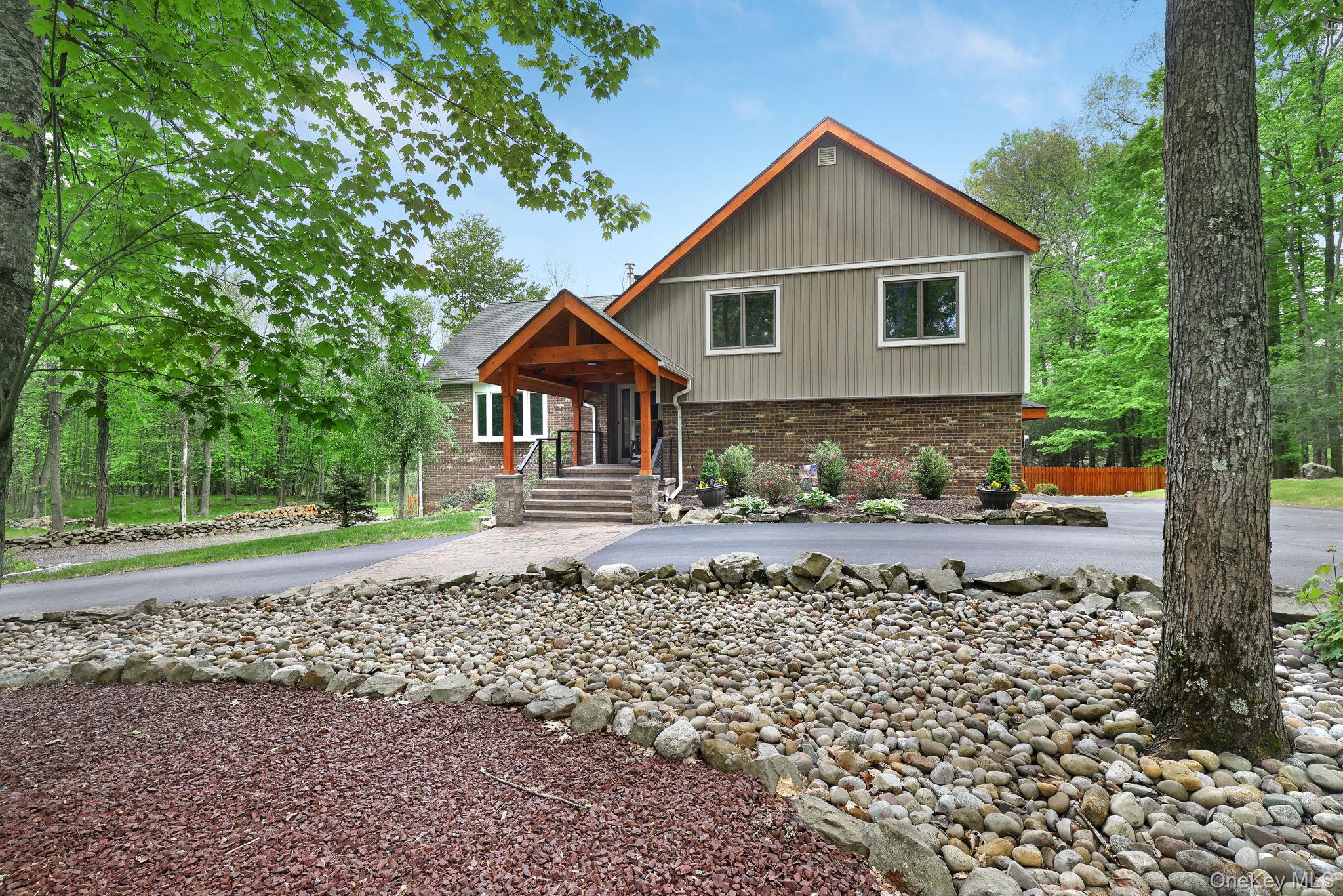90 M And M Road Middletown, NY 10940 - Photo 43 of 50 a front view of a house with a yard