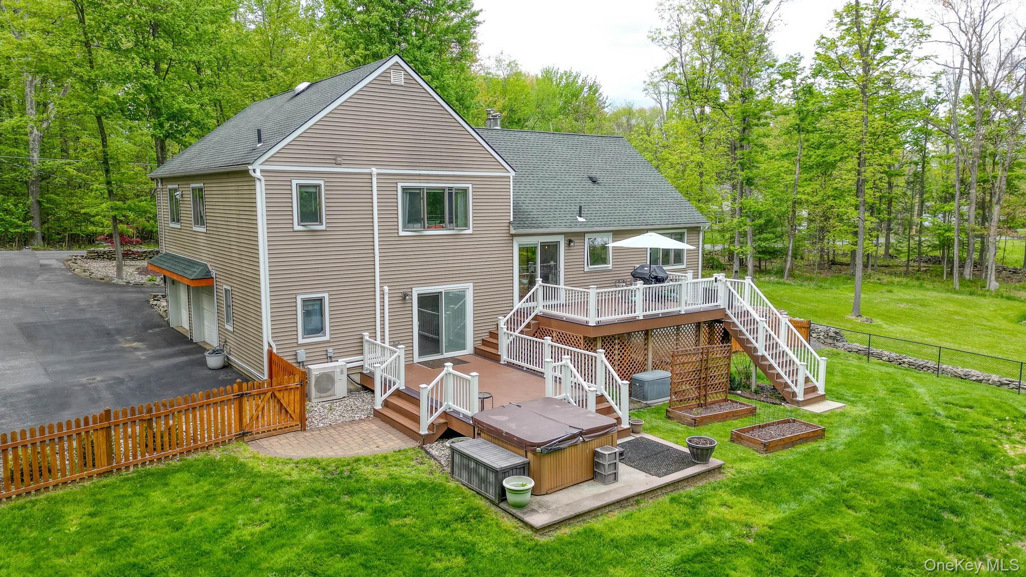 90 M And M Road Middletown, NY 10940 - Photo 48 of 50 a aerial view of a house with a yard patio and fire pit
