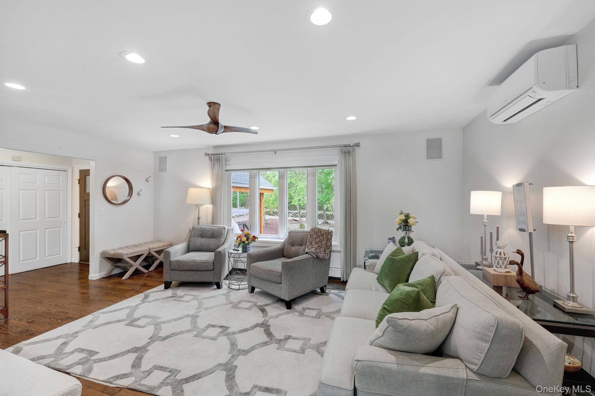 90 M And M Road Middletown, NY 10940 - Photo 6 of 50 a living room with furniture and a large window