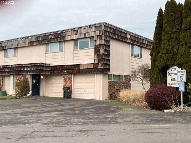 2727 Gateway Street, Unit 2 Springfield, OR 97477 - Photo 1 of 2 a front view of a house with a garage