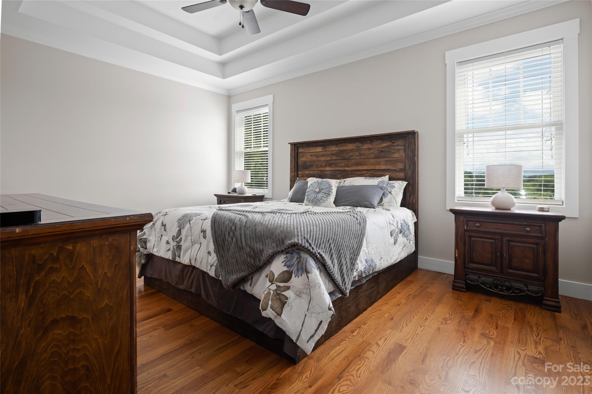 1480 Jenkins Valley Road Alexander, NC 28701 - Photo 16 of 40 a bedroom with a bed and a dresser