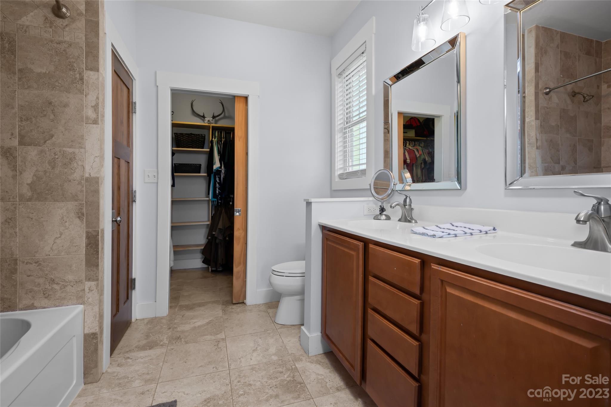 1480 Jenkins Valley Road Alexander, NC 28701 - Photo 18 of 40 a bathroom with a sink and a mirror
