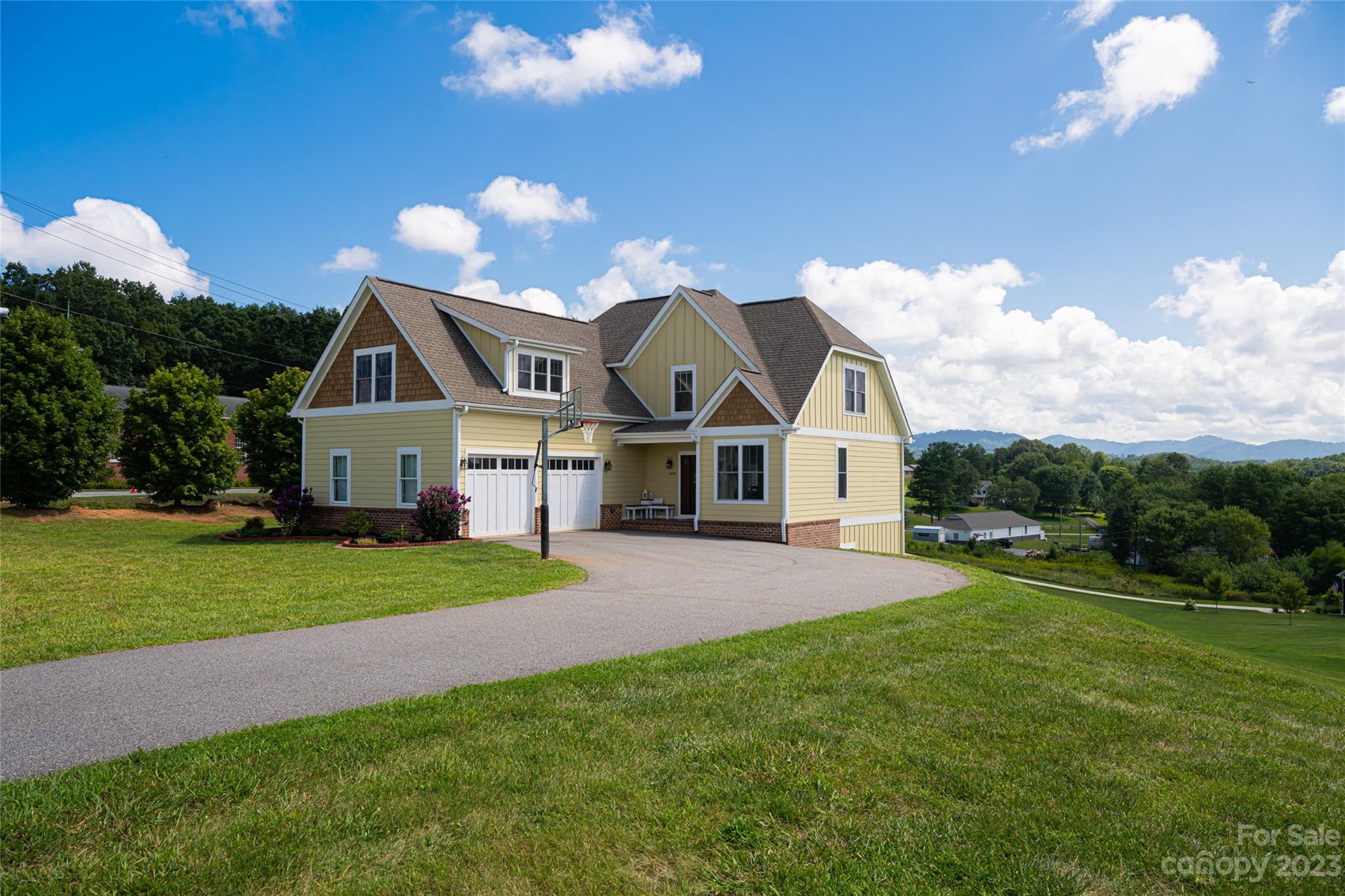 1480 Jenkins Valley Road Alexander, NC 28701 - Photo 2 of 40 a front view of a house with garden