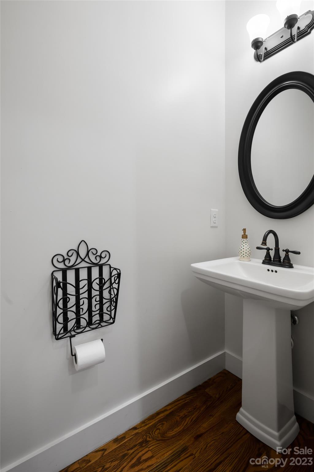 1480 Jenkins Valley Road Alexander, NC 28701 - Photo 21 of 40 a bathroom with a sink mirror and vanity