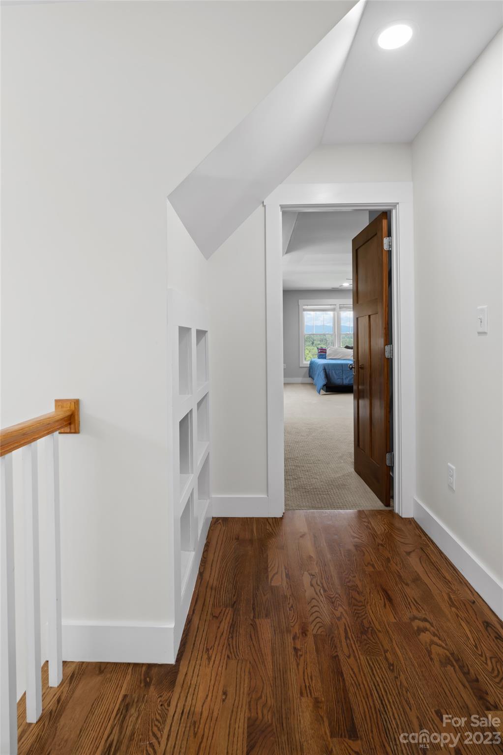 1480 Jenkins Valley Road Alexander, NC 28701 - Photo 24 of 40 a view of a hallway view with wooden floor and furniture