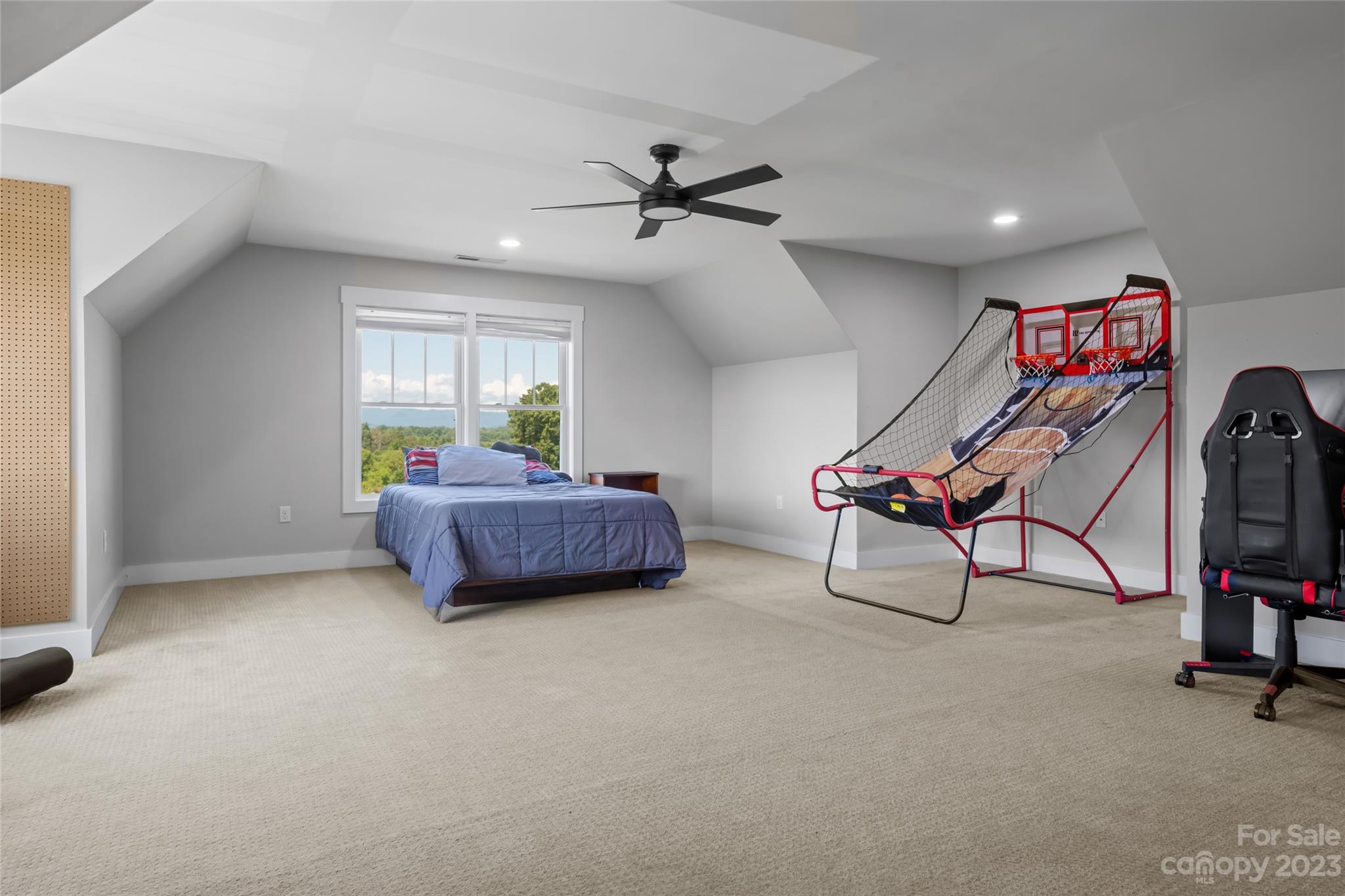 1480 Jenkins Valley Road Alexander, NC 28701 - Photo 25 of 40 a living room with furniture and a flat screen tv