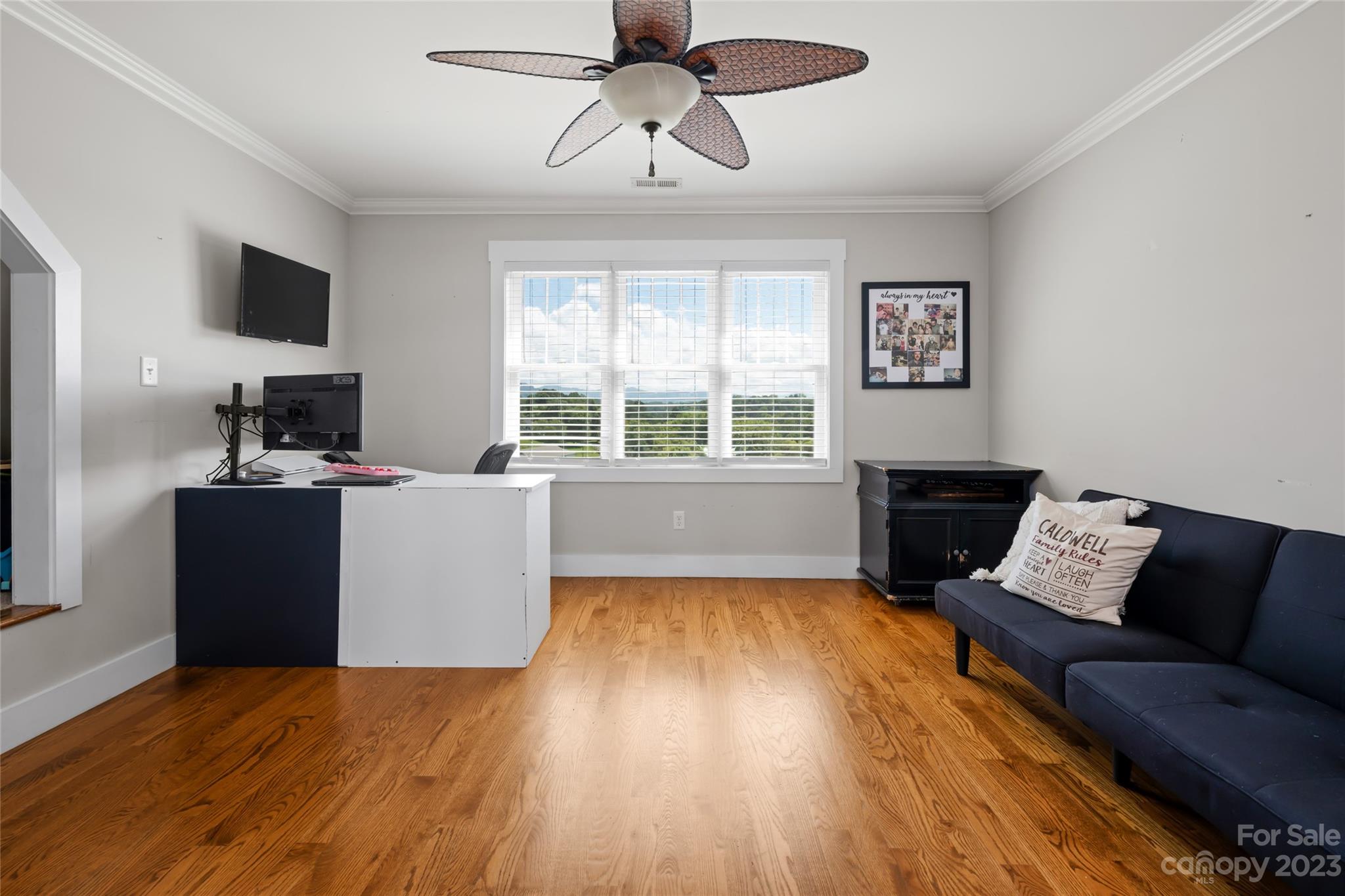1480 Jenkins Valley Road Alexander, NC 28701 - Photo 30 of 40 a living room with furniture and a flat screen tv