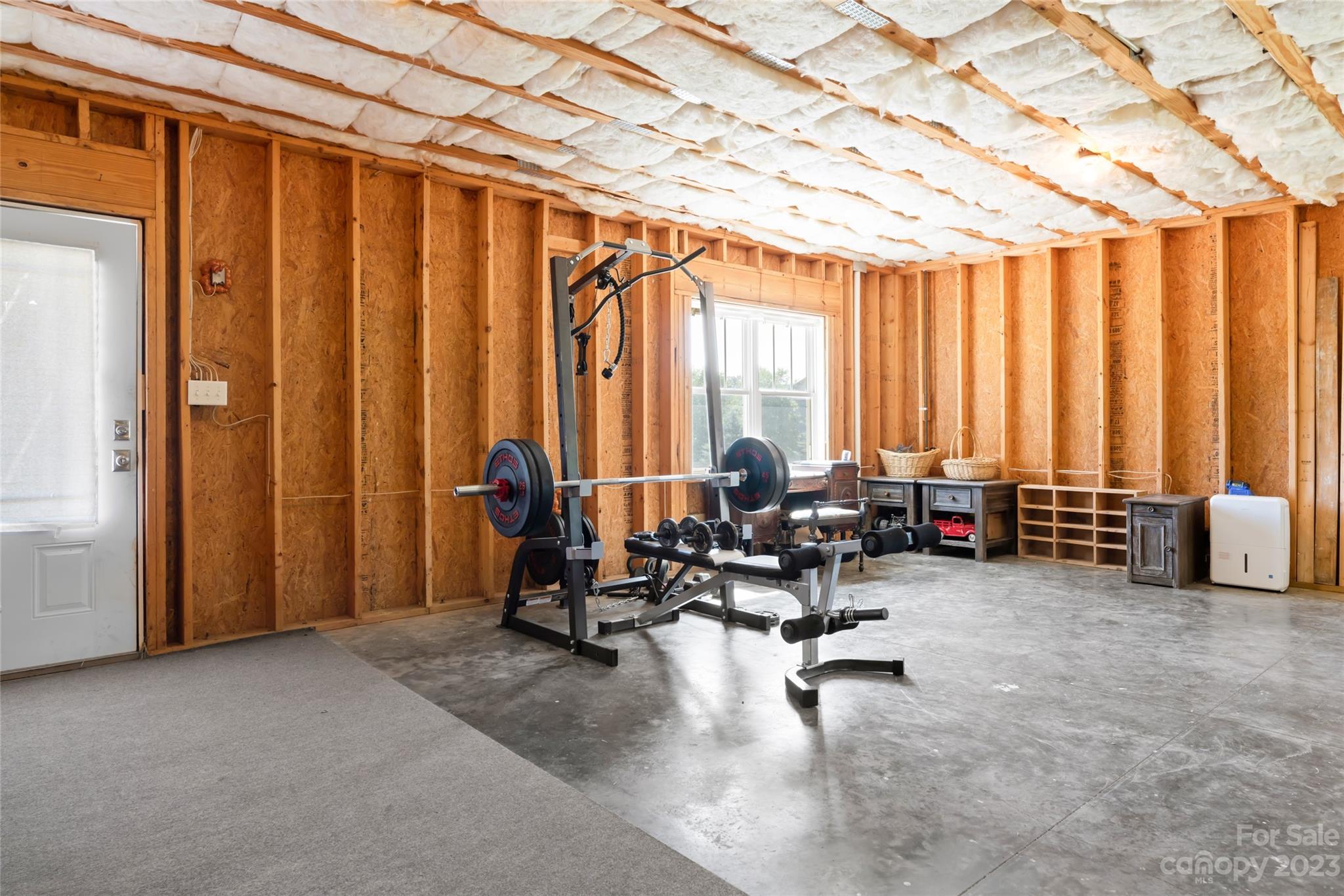 1480 Jenkins Valley Road Alexander, NC 28701 - Photo 34 of 40 a view of a room with furniture and floor to ceiling window