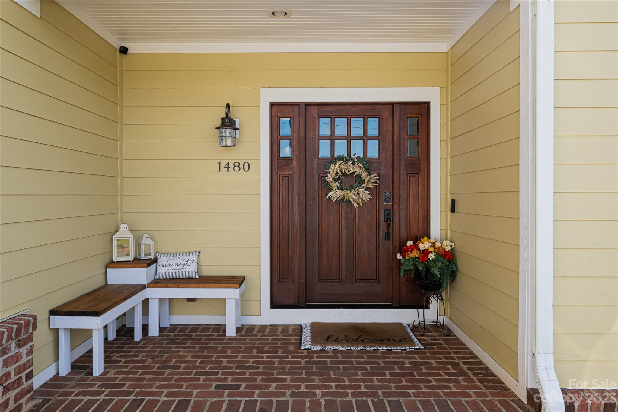 1480 Jenkins Valley Road Alexander, NC 28701 - Photo 5 of 40 a view of a entryway with flower pots