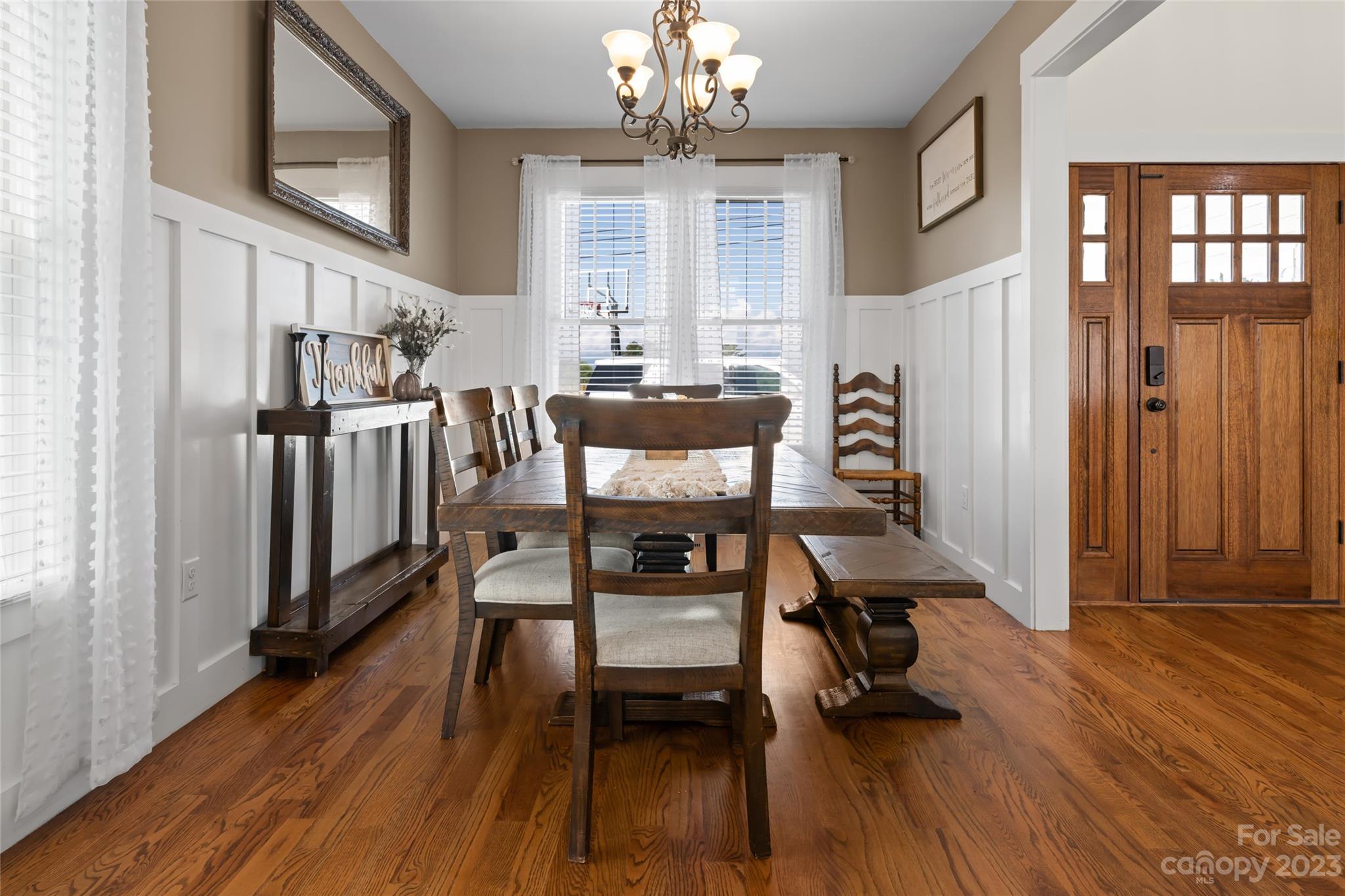 1480 Jenkins Valley Road Alexander, NC 28701 - Photo 6 of 40 a view of a dining room with furniture window and wooden floor