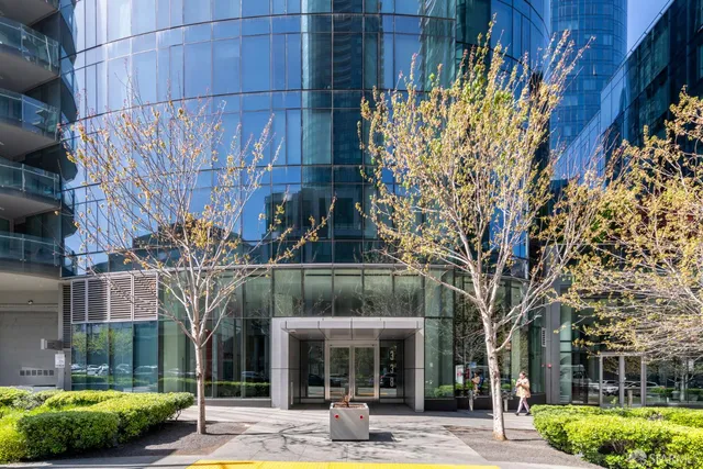 a front view of a building with garden