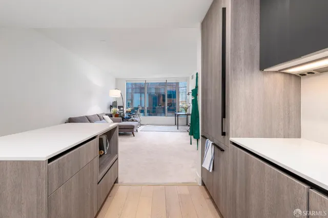 a kitchen with a sink and an oven
