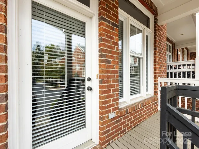 a view of a balcony with an outdoor space