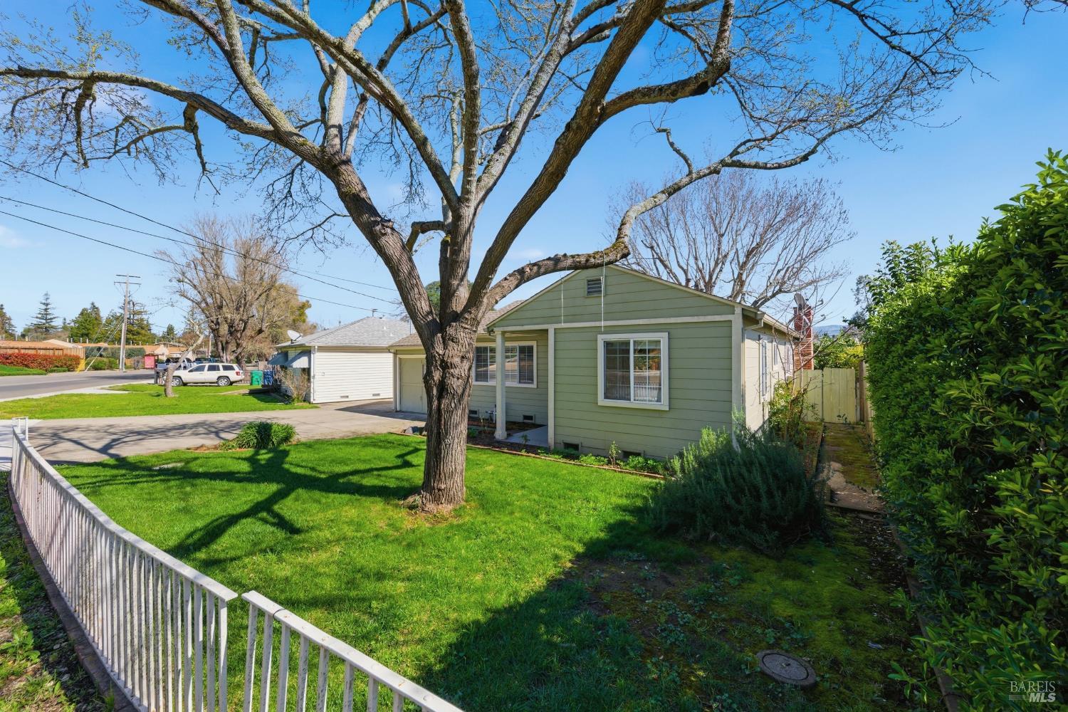 3188 Laurel Street Napa, CA 94558 - Photo 3 of 49 a front view of a house with garden