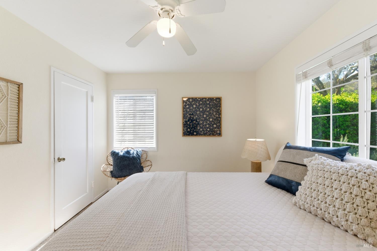 3188 Laurel Street Napa, CA 94558 - Photo 31 of 49 a bedroom with a bed and a large window