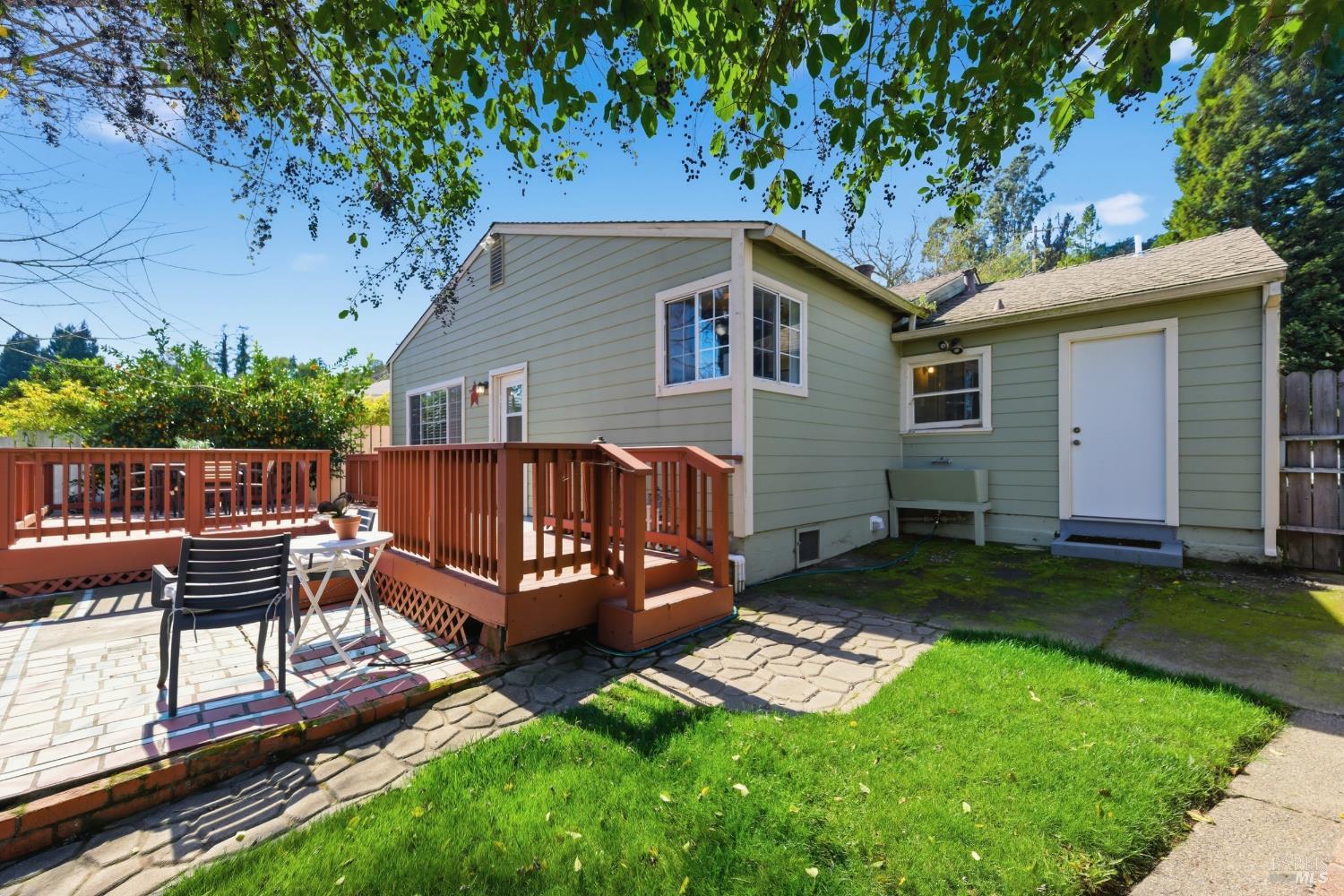 3188 Laurel Street Napa, CA 94558 - Photo 40 of 49 a view of a house with a yard chairs and a table