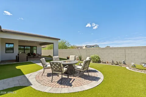 a view of a swimming pool with lounge chair