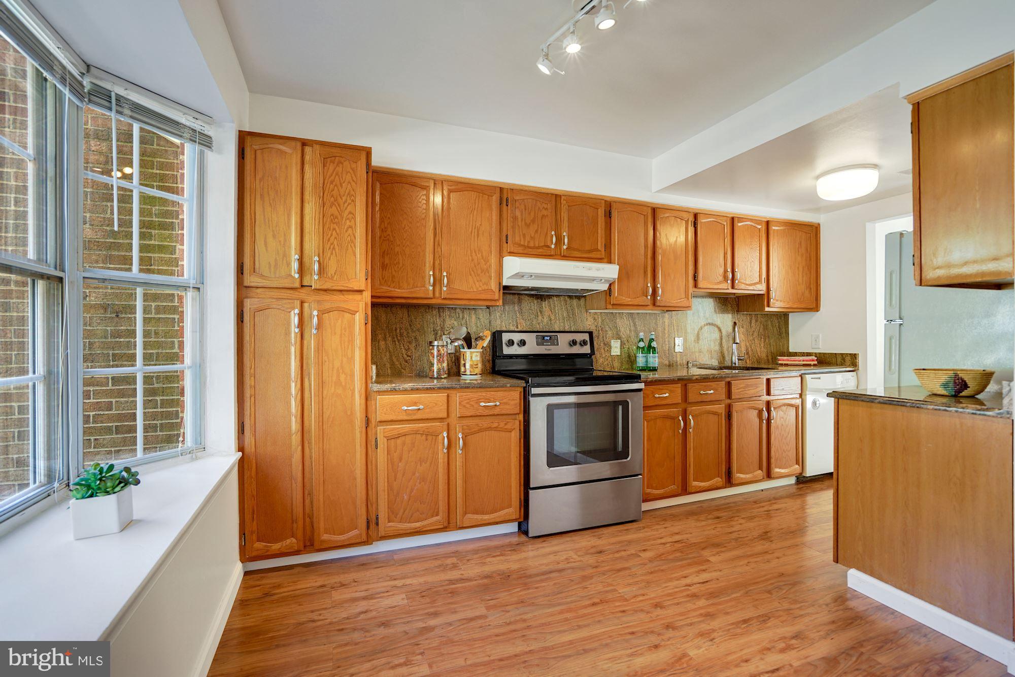 6356 Shaundale Drive Springfield, VA 22152 - Photo 8 of 28 Large eat-in kitchen with new floors + bay windows