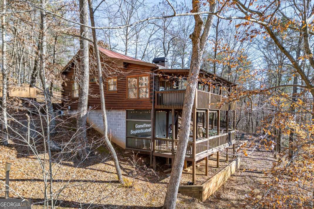 100 Smith Hill Road Blue Ridge, GA 30513 - Photo 45 of 66 a view of a house with a tree