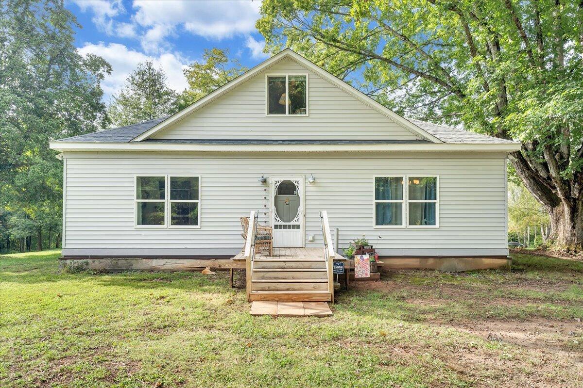 568 Moores Mill Road Ridgeway, VA 24148 - Photo 3 of 51 a view of a house with a yard