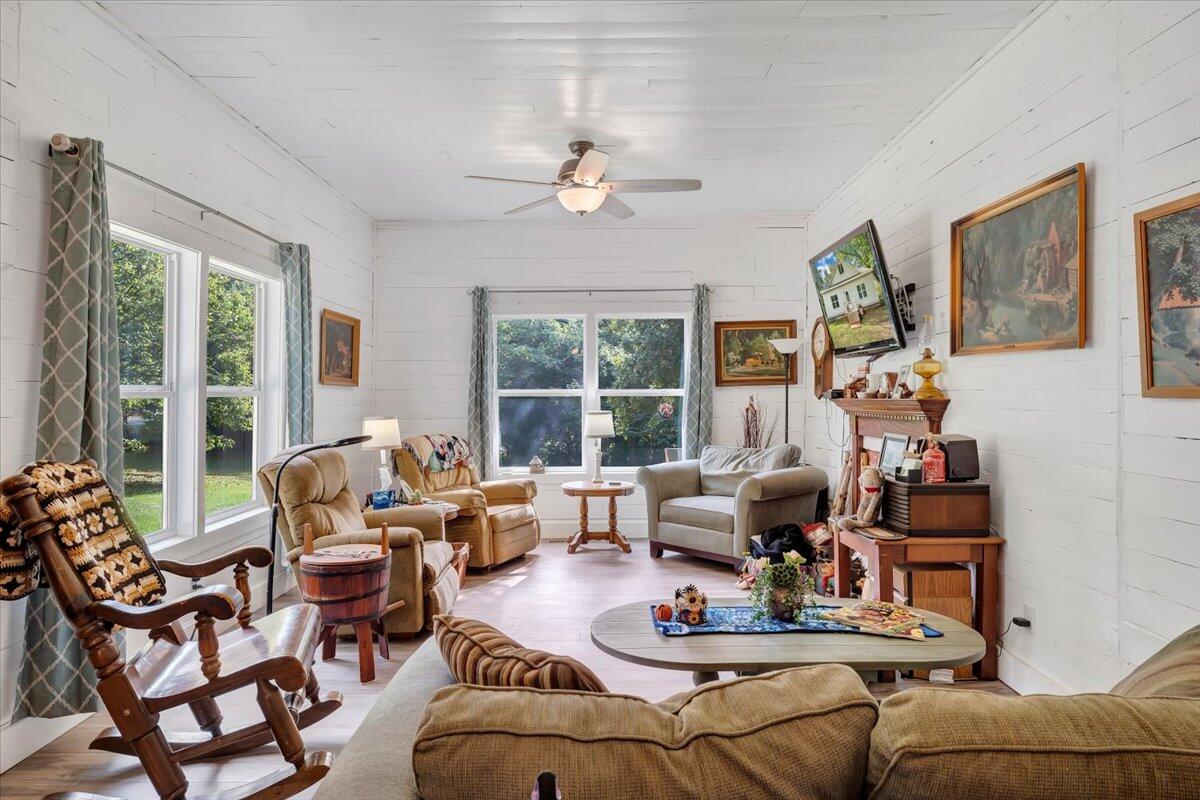 568 Moores Mill Road Ridgeway, VA 24148 - Photo 5 of 51 a living room with furniture and a large window