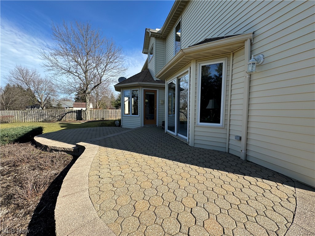 9615 Johnnycake Ridge Road Mentor, OH 44060 - Photo 11 of 35 View of back yard, patio and sliding glass door access to the living room