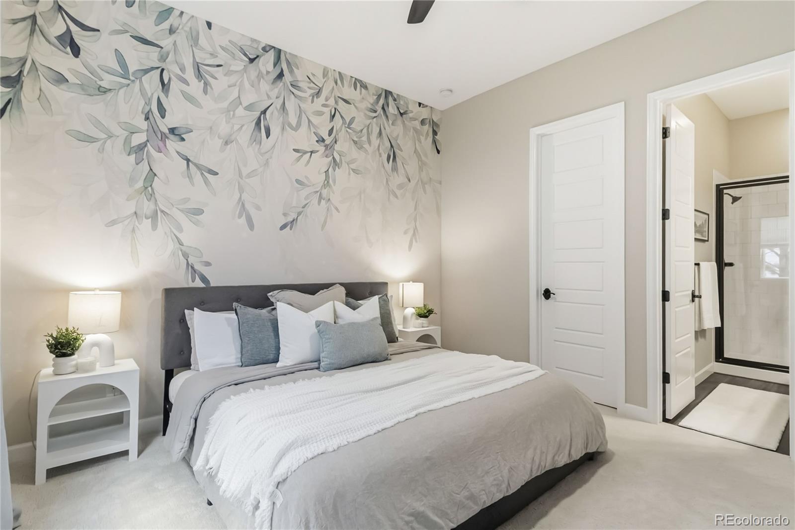 3117 Keepsake Way Castle Rock, CO 80109 - Photo 22 of 50 a bedroom with a bed and a chair