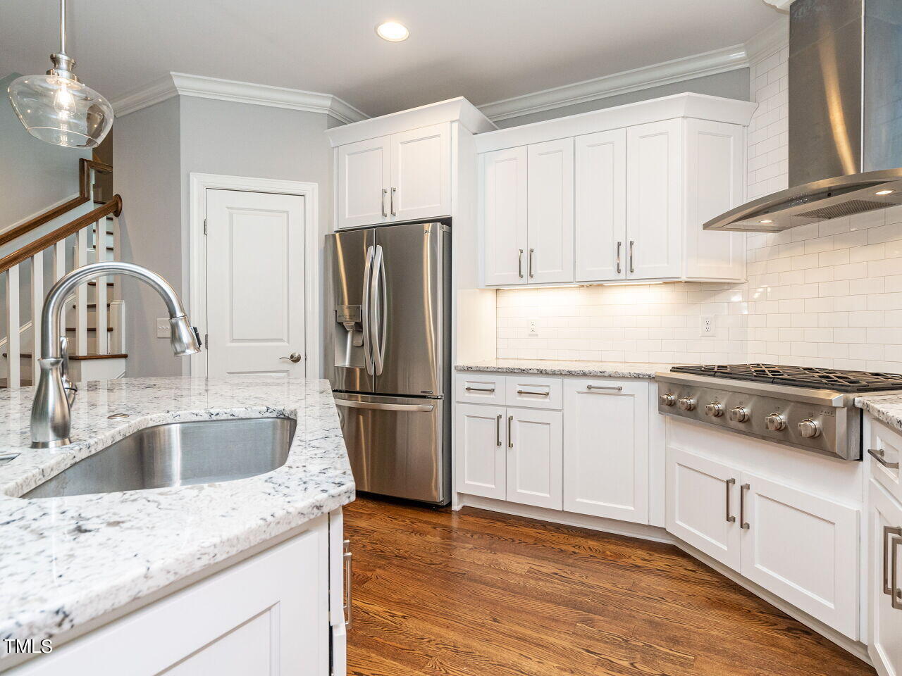 1506 East Jones Street Raleigh, NC 27610 - Photo 12 of 35 a kitchen with appliances a sink and cabinets