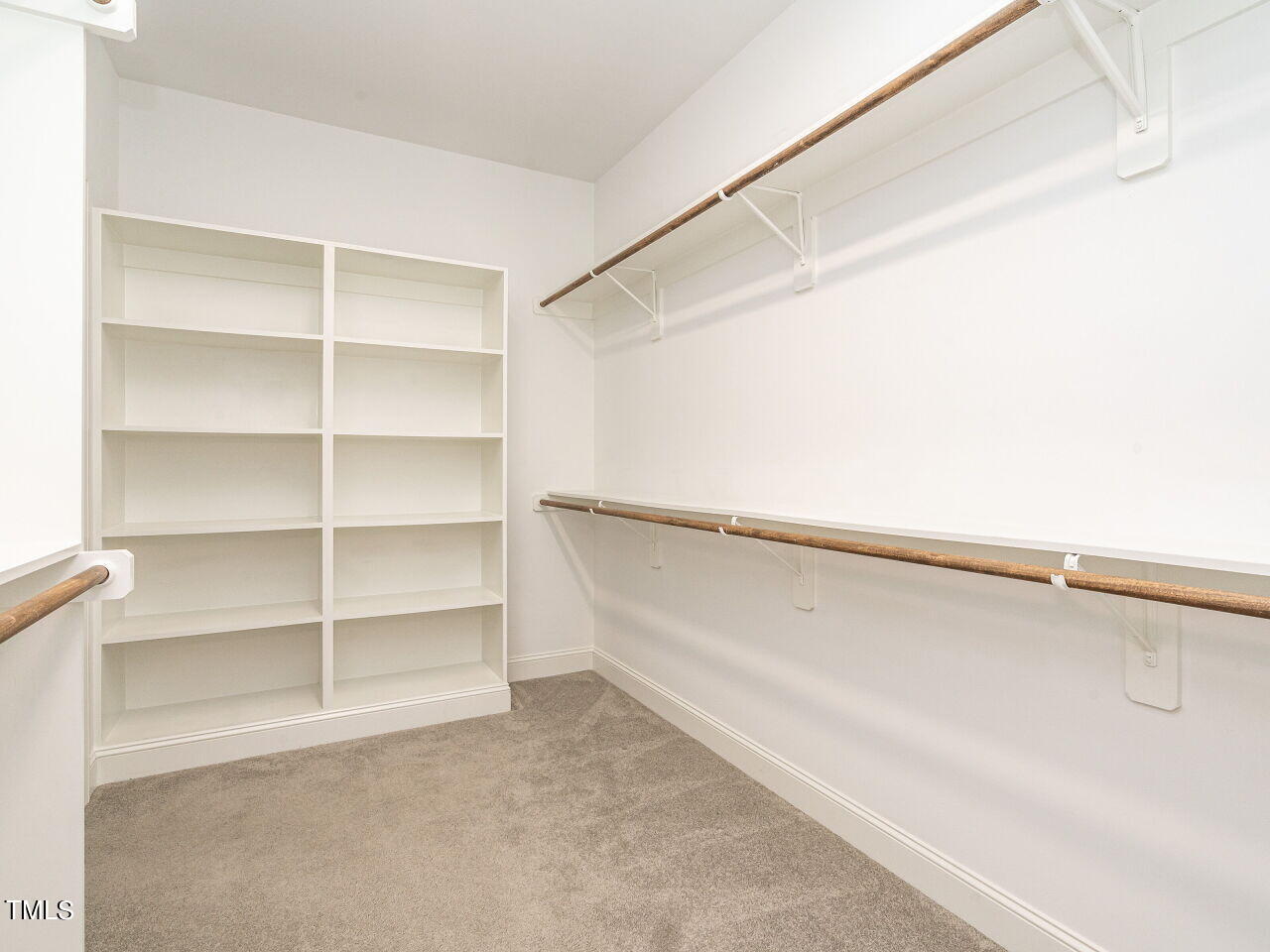 1506 East Jones Street Raleigh, NC 27610 - Photo 17 of 35 a view of an empty walk in closet