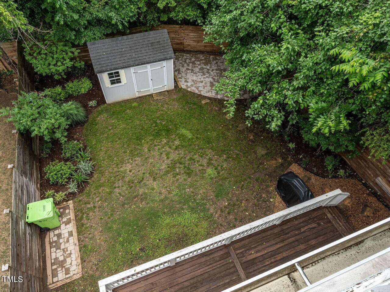 1506 East Jones Street Raleigh, NC 27610 - Photo 27 of 35 a view of a yard from a balcony