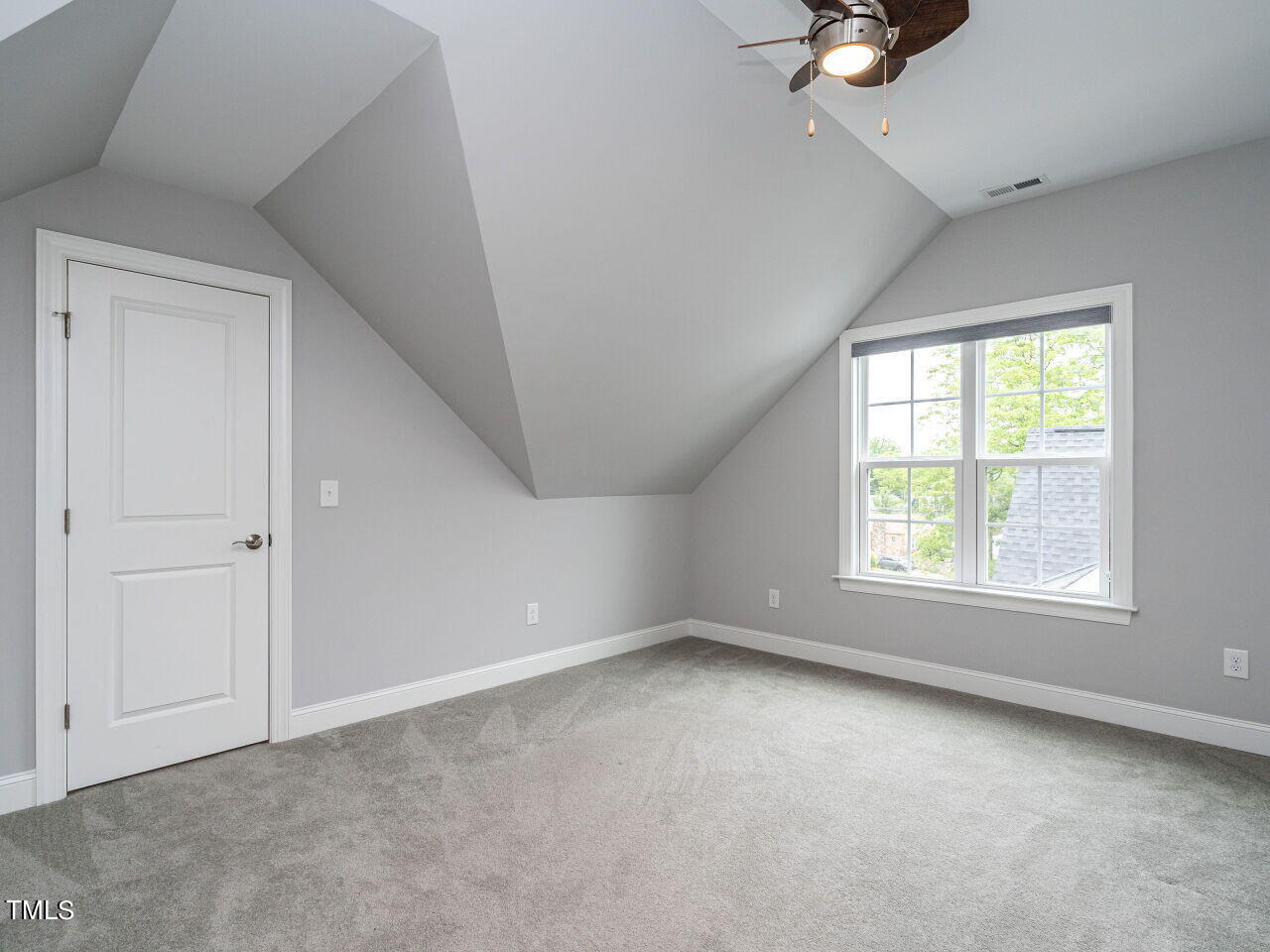 1506 East Jones Street Raleigh, NC 27610 - Photo 28 of 35 an empty room with a window