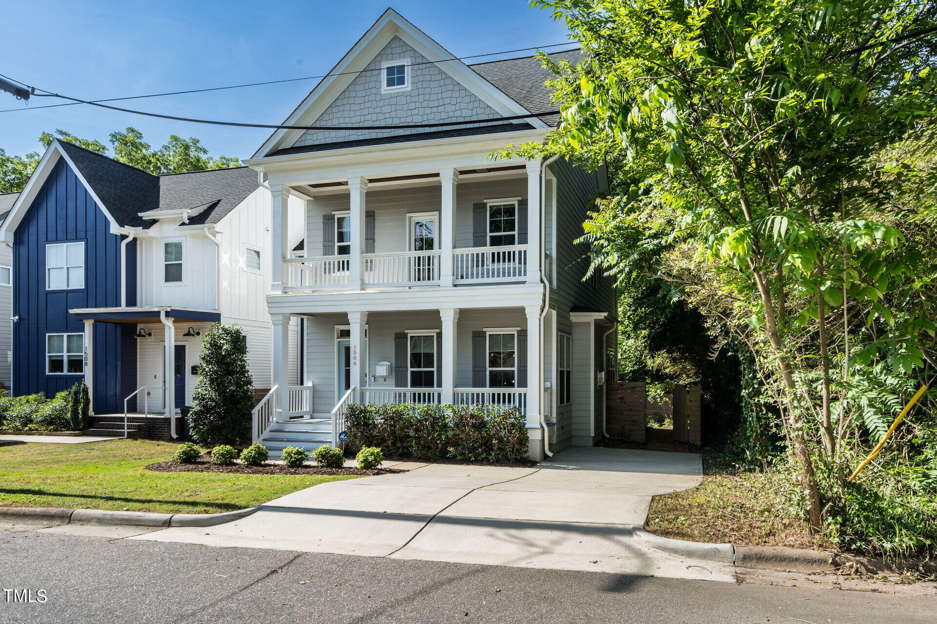 1506 East Jones Street Raleigh, NC 27610 - Photo 33 of 35 a front view of a house with a yard