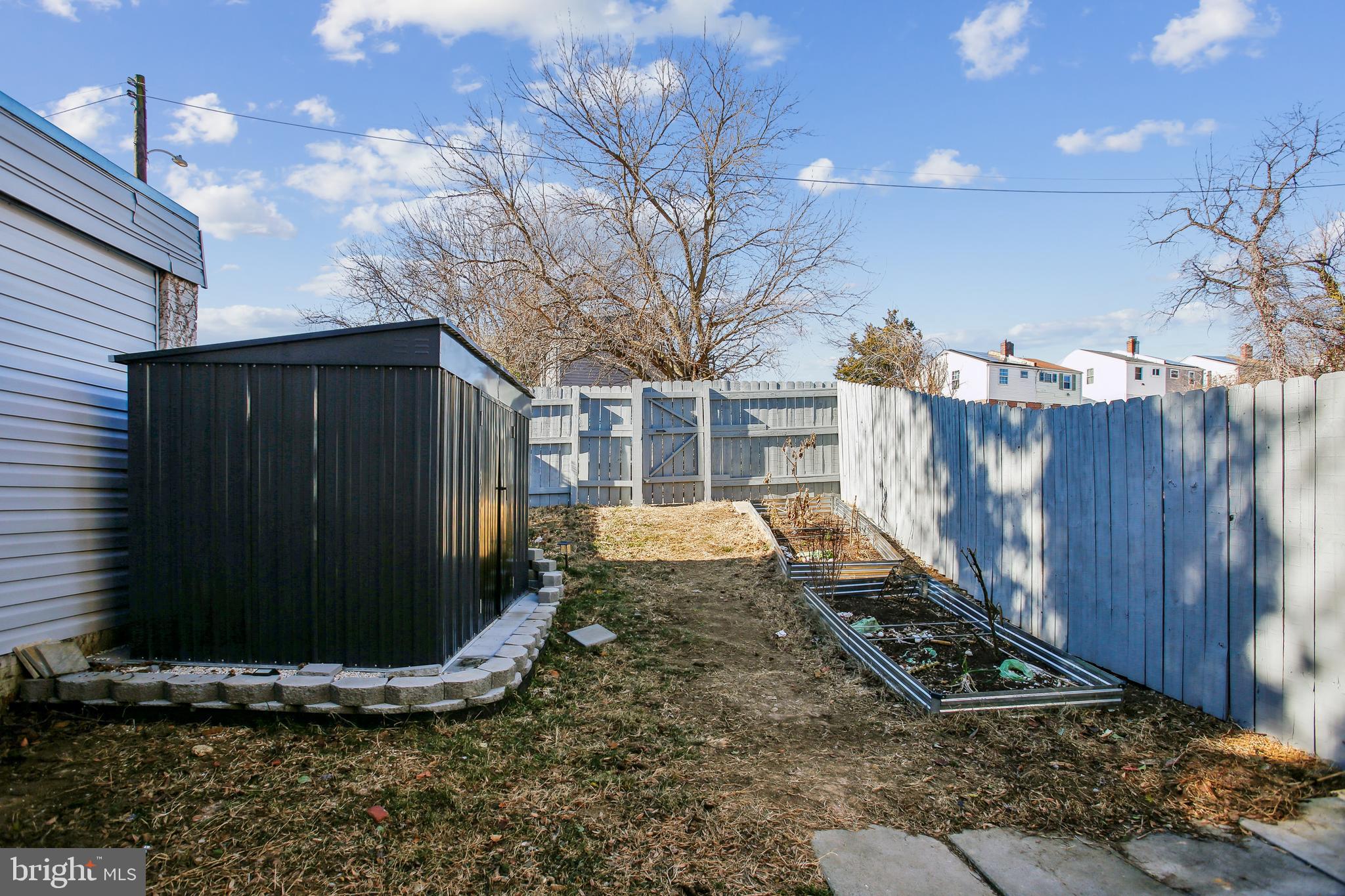 836 Division Avenue Northeast Washington, DC 20019 - Photo 28 of 36 a view of a backyard with pathway