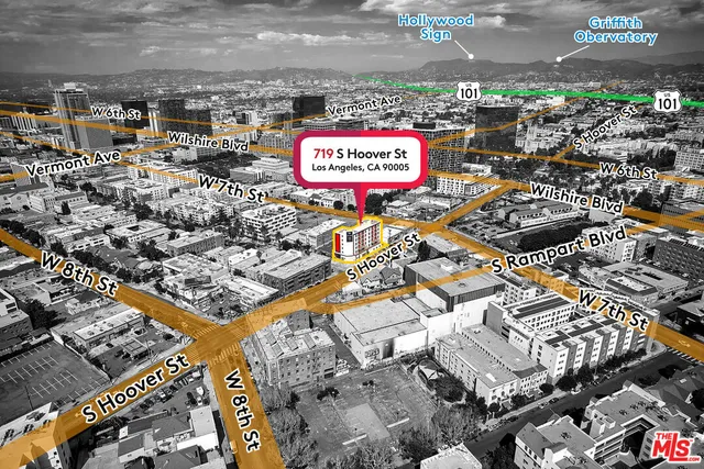 a view of a street with sitting space