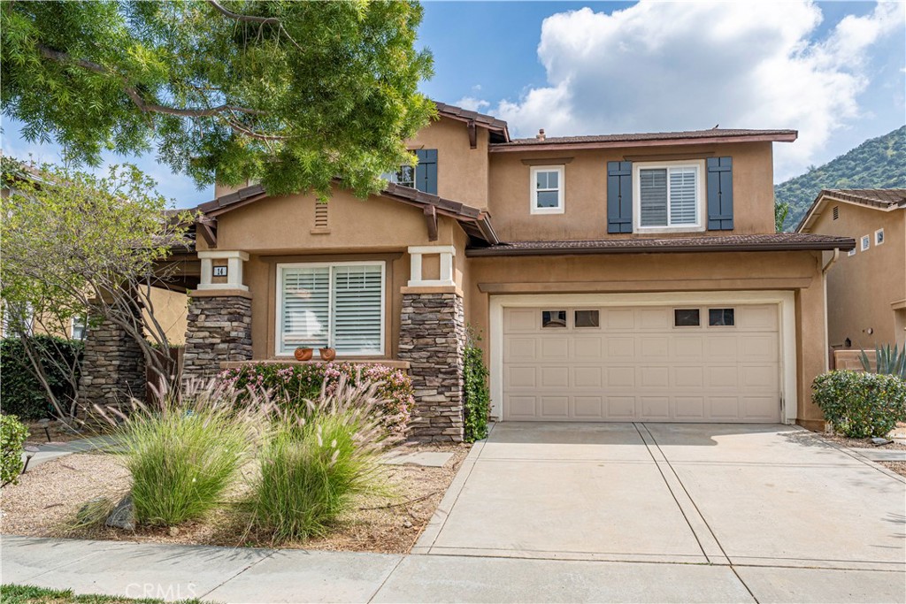 14 Sagebrush Way Azusa, CA 91702 - Photo 1 of 1 a front view of a house with a garden