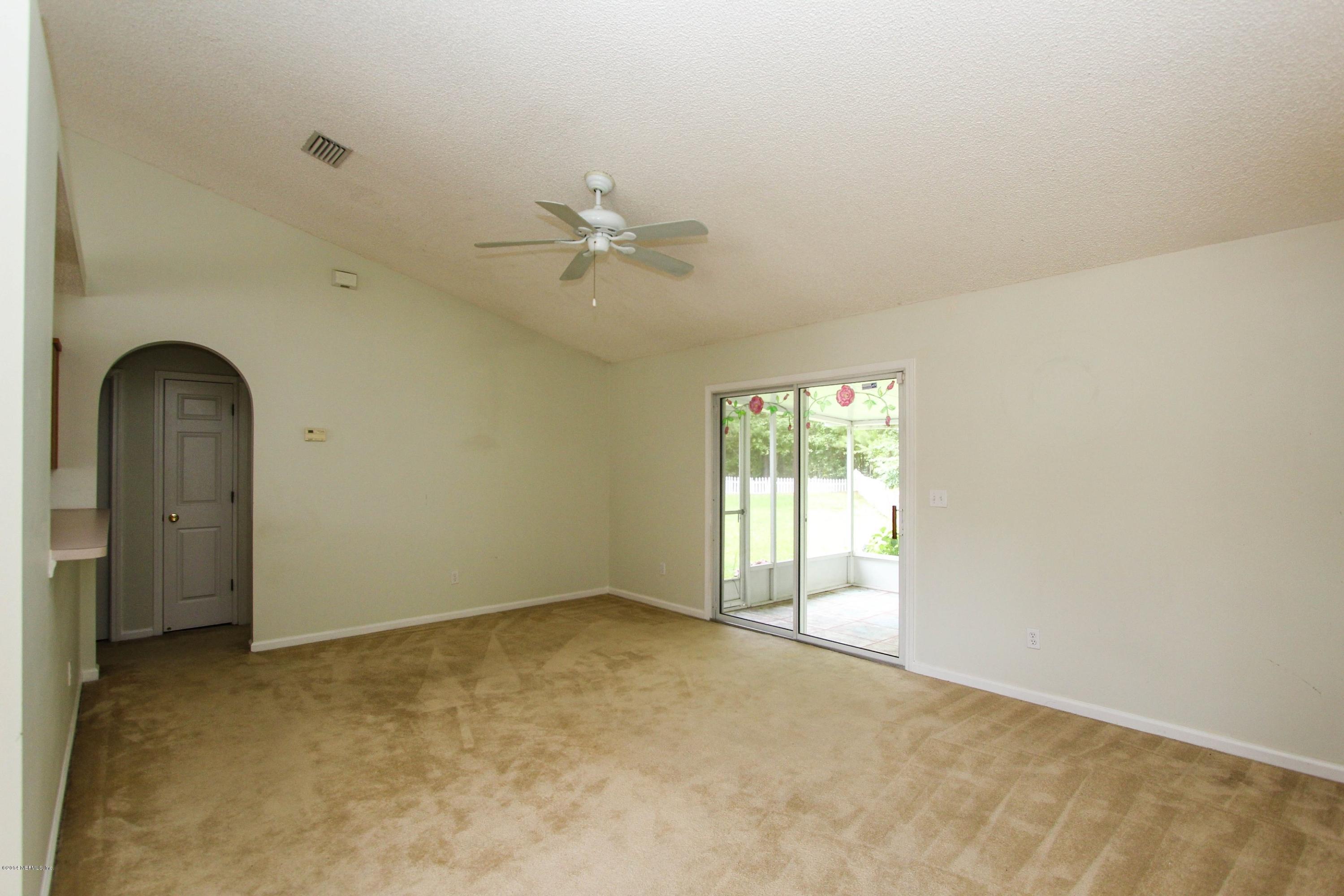 2750 Archer Street Middleburg, FL 32068 - Photo 17 of 34 a view of an empty room with a window