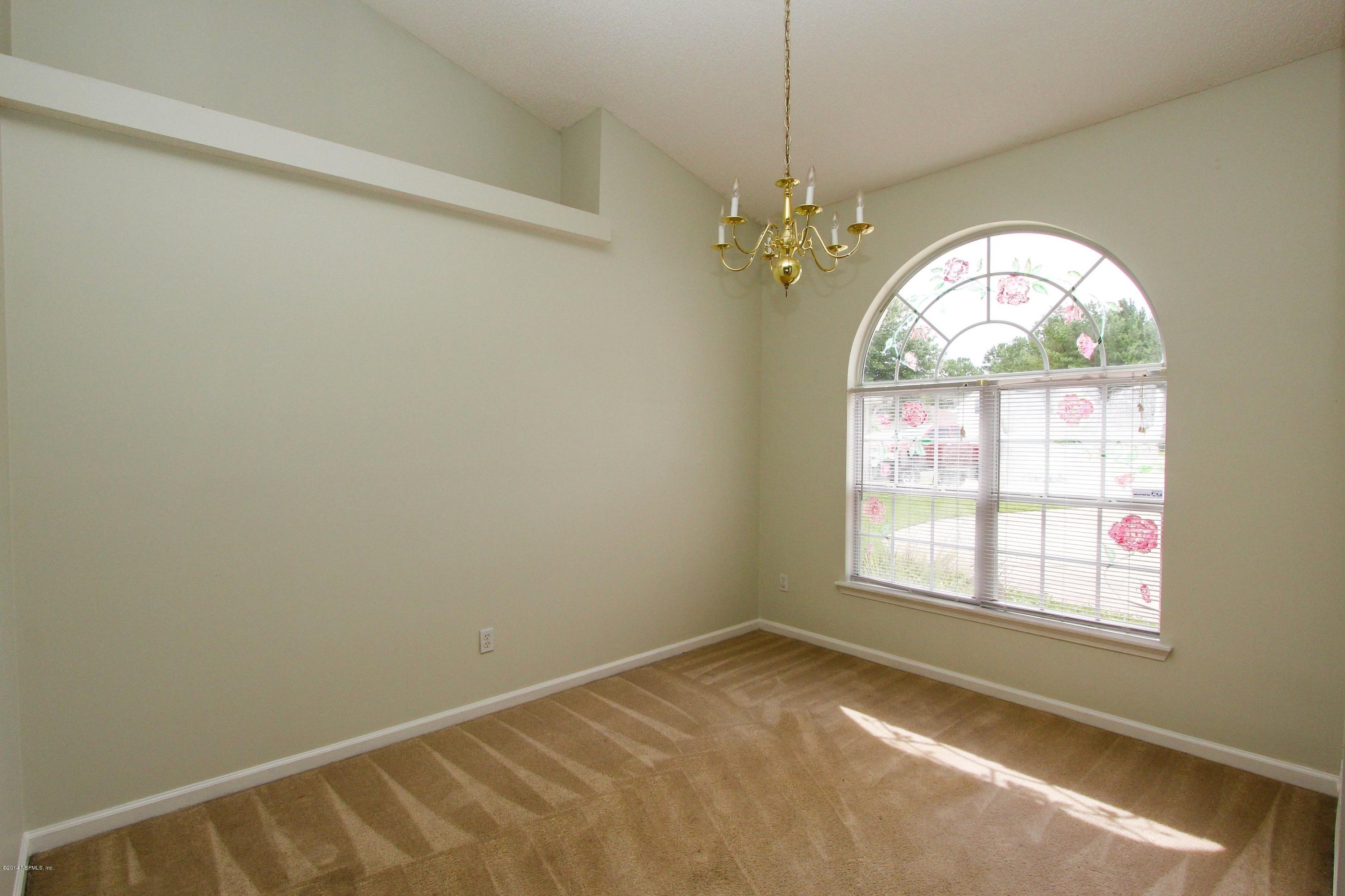 2750 Archer Street Middleburg, FL 32068 - Photo 19 of 34 an empty room with a window
