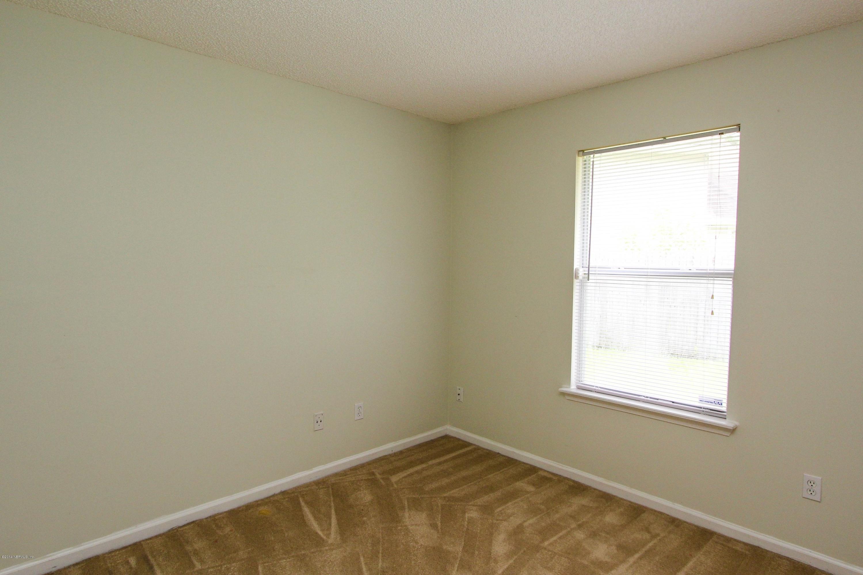 2750 Archer Street Middleburg, FL 32068 - Photo 26 of 34 an empty room with a window