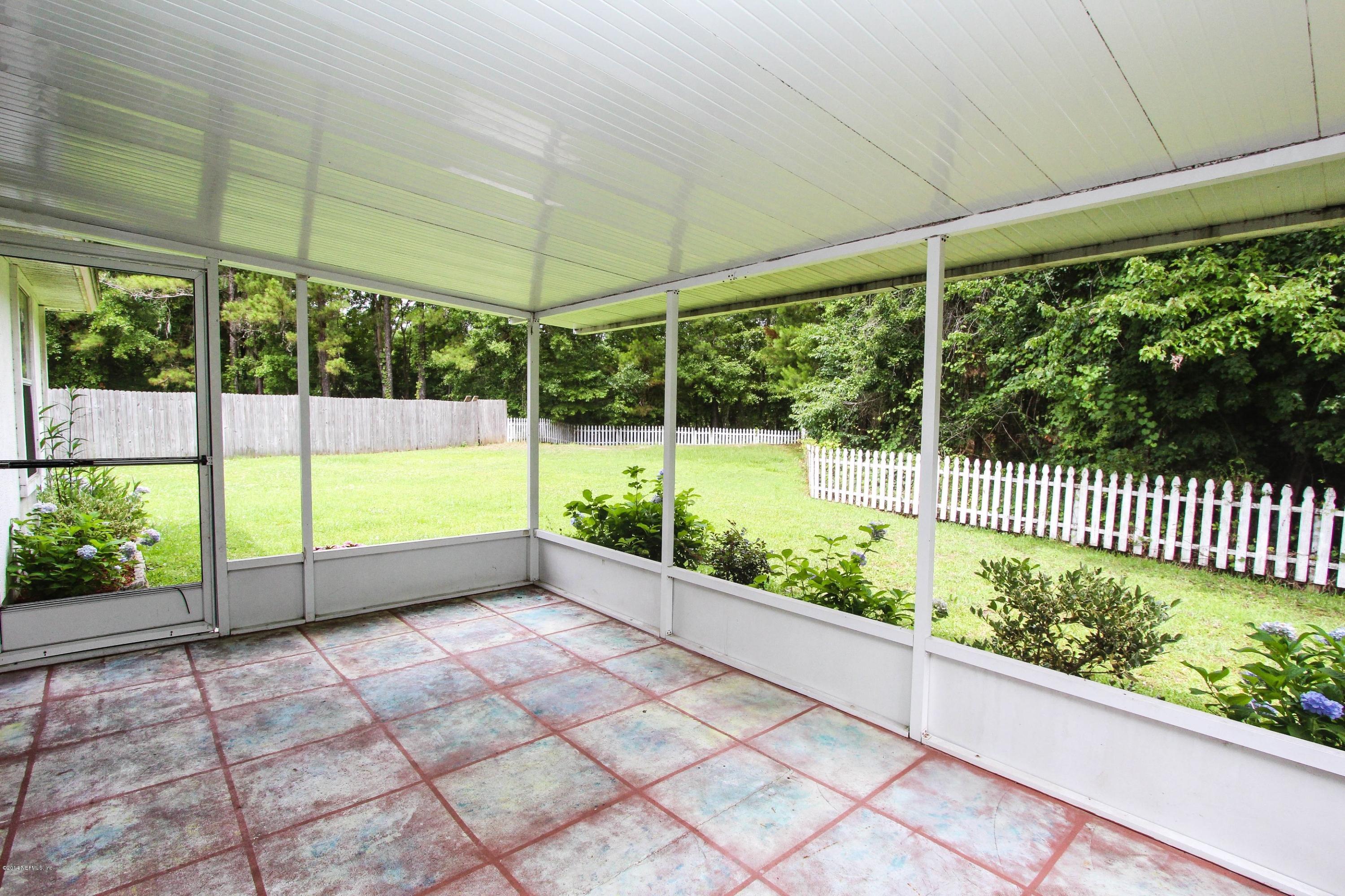 2750 Archer Street Middleburg, FL 32068 - Photo 28 of 34 a view of a deck with a back yard